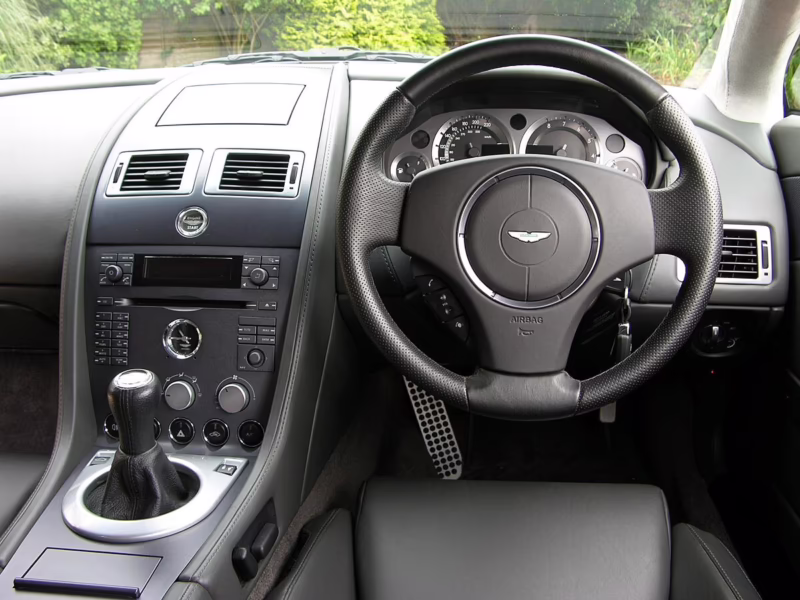 What is the top speed of the 2006 Aston Martin Vantage?