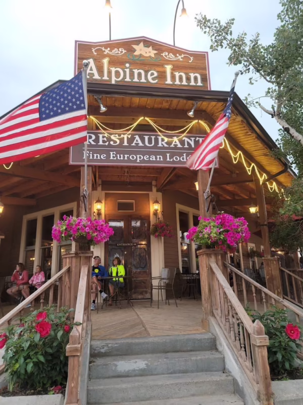 What are the hours of the Alpine Inn in Hill City, South Dakota?