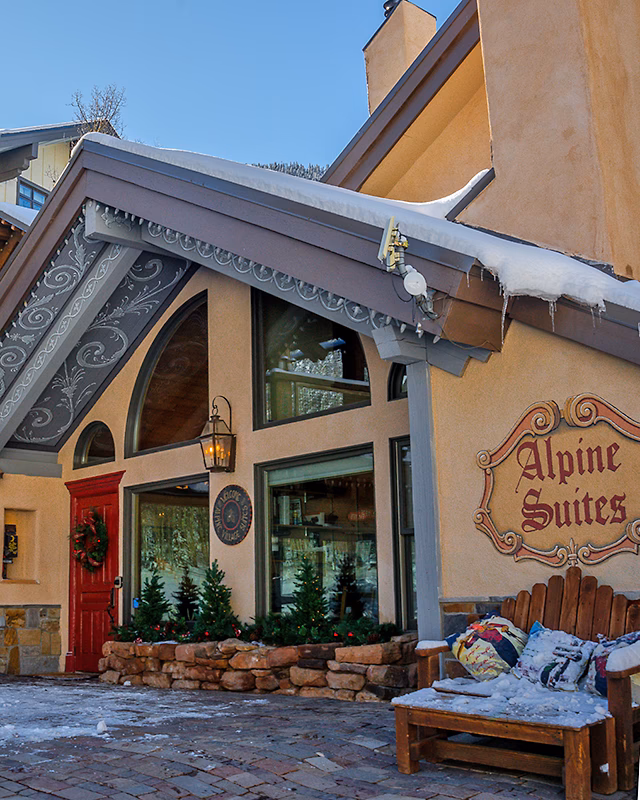 What is the average price per night at Alpine Village Suites?