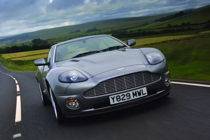 What is the top speed of the 2006 Aston Martin Vanquish?