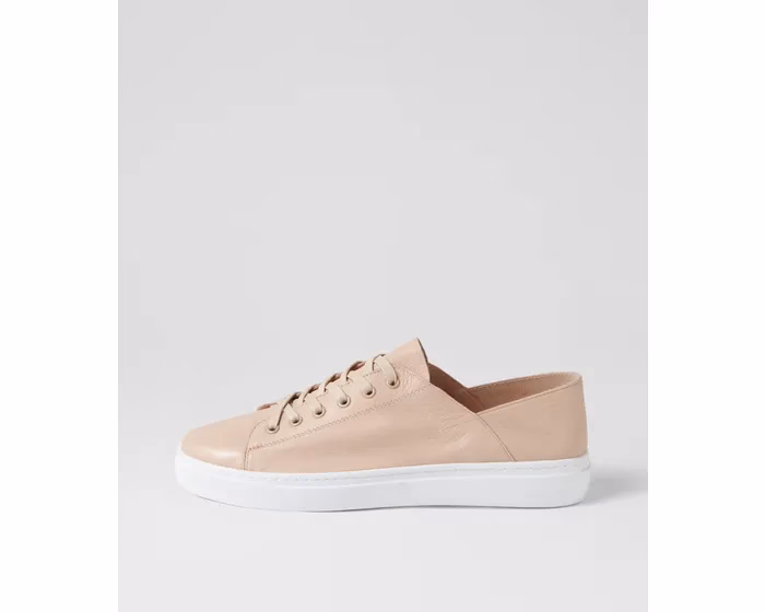 Can a 60 year old woman wear sneakers?