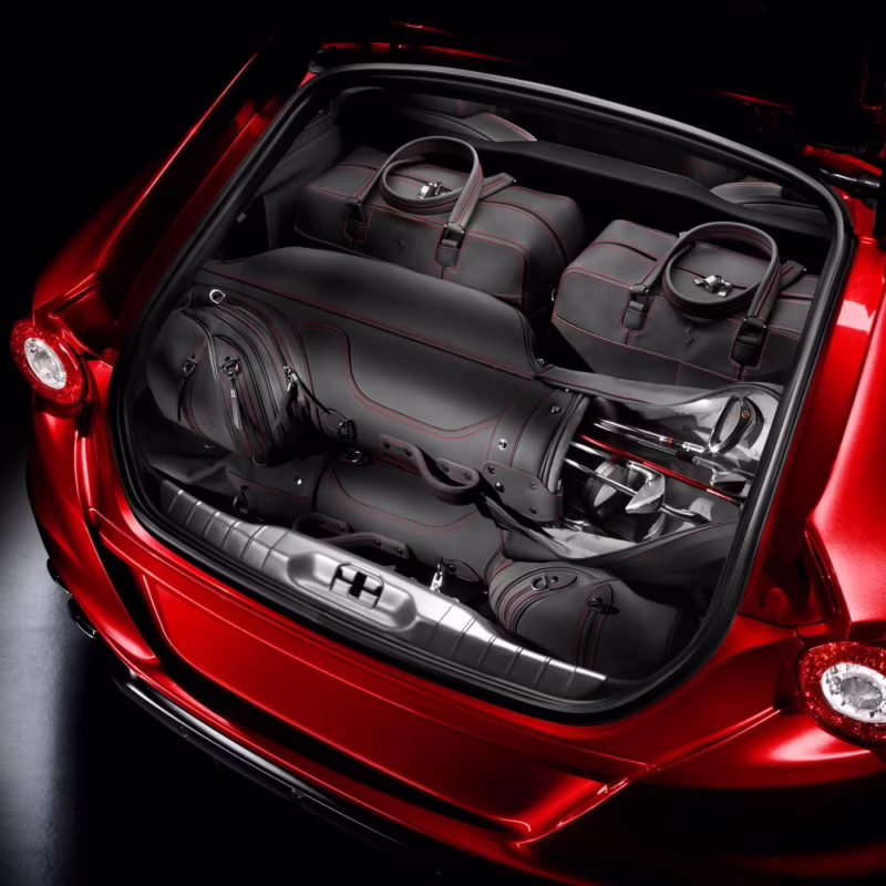 Who makes Ferrari luggage?