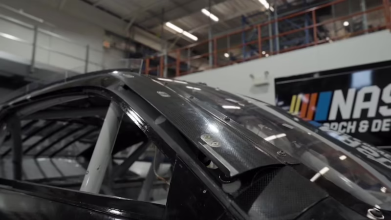 Who broke the 200 mph in NASCAR?