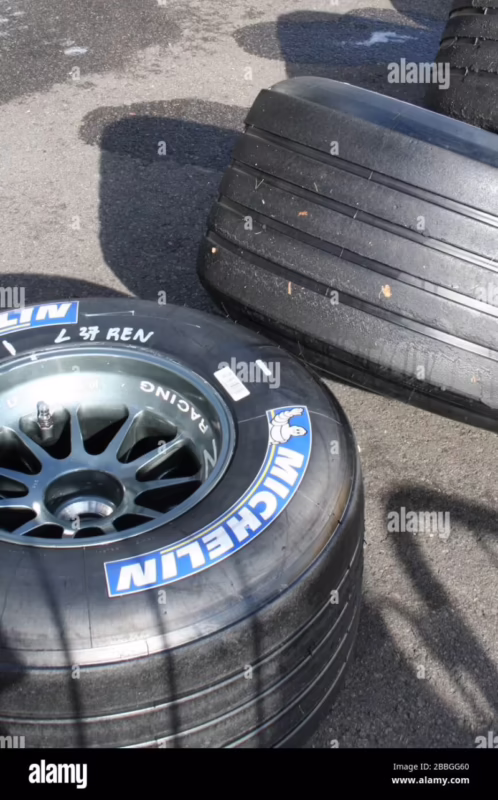 Why did 2000s F1 cars not have slicks?